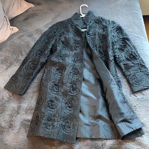 Sleek Black Trench Coat with Timeless Elegance